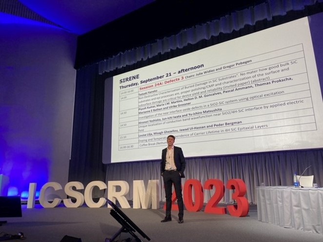 Gregor Pobegen on stage at the ICSCRM 2023 conference